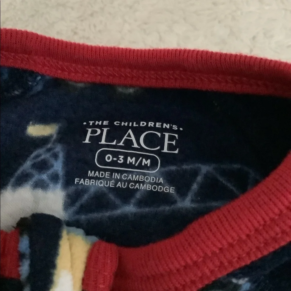 Place one-size zipper outfit with big machines 0-3mo